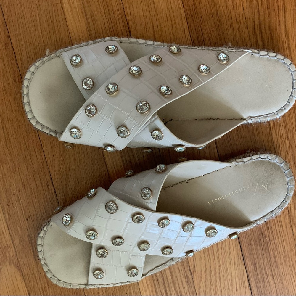 Gently worn off white slide on sandals